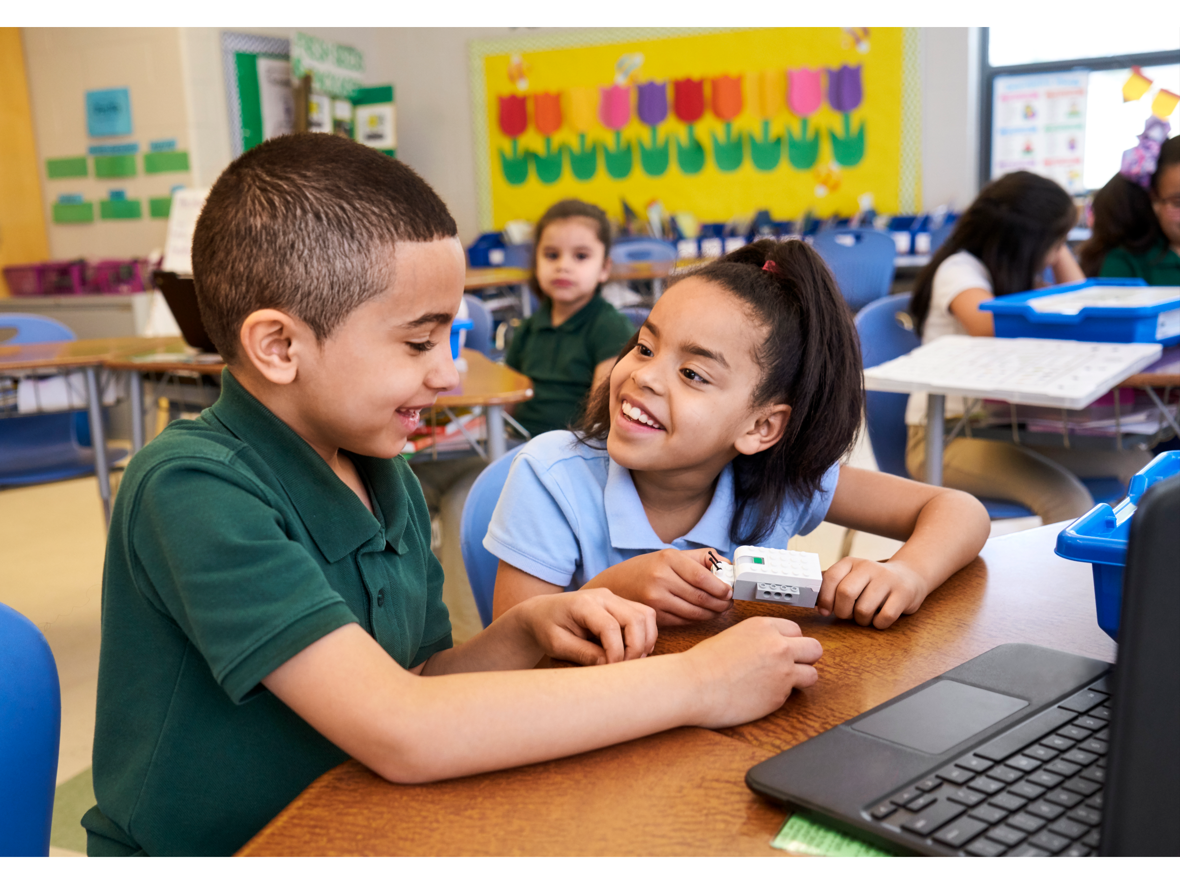 Two primary school students tinkering and learning with WeDo 2.0. at a LEGO Education camp.